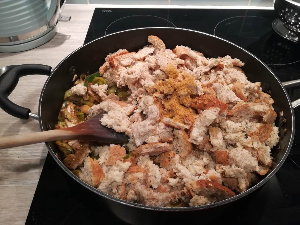 Add the shredded breadcrumbs and crumbled stock cube.